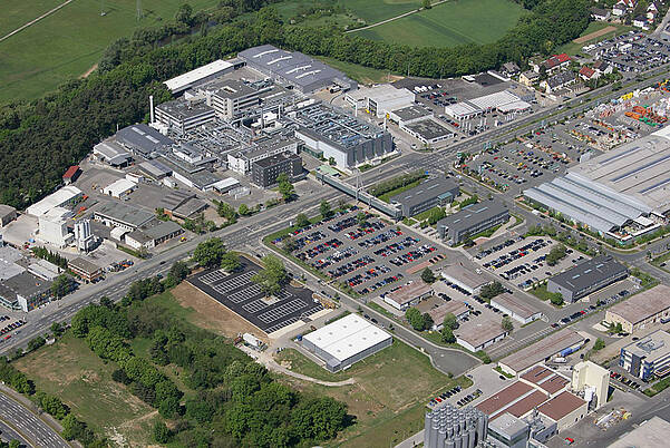 Reducing CO2 Emissions & Conserving Resources with KURZ KURZ headquarters with solar panels from a bird's eye view