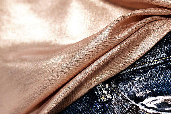 Textile finishing in various colored metallic foils