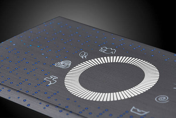 Haptic Surface Experiences with Soft-Touch in Injection Molding Injection molded part with backlit touch design